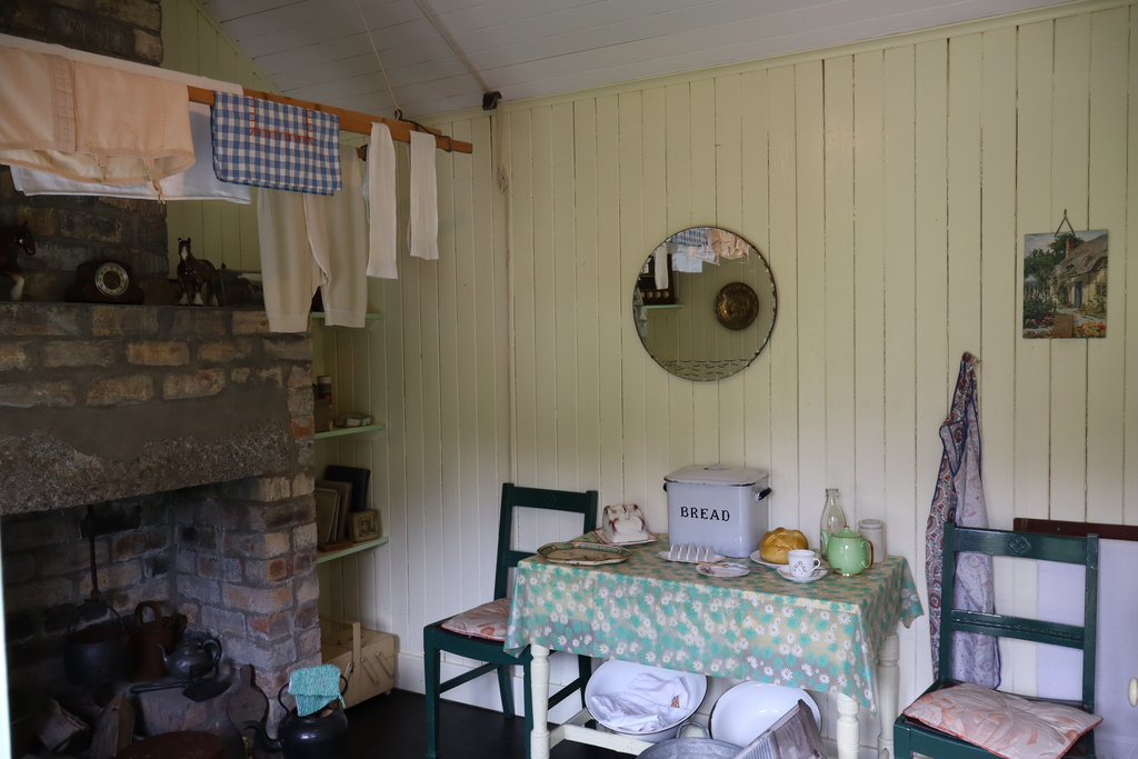 Inside a traditional Scottish house at the Highland Folk Museum showing the kitchen and laundry