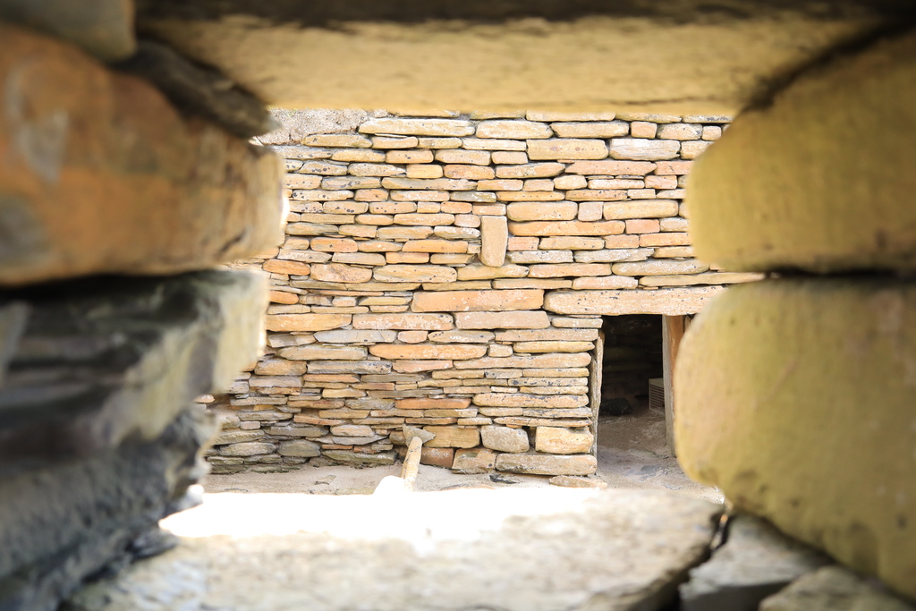 Looking through a 5000 year old window at Skara Brae Orkney
