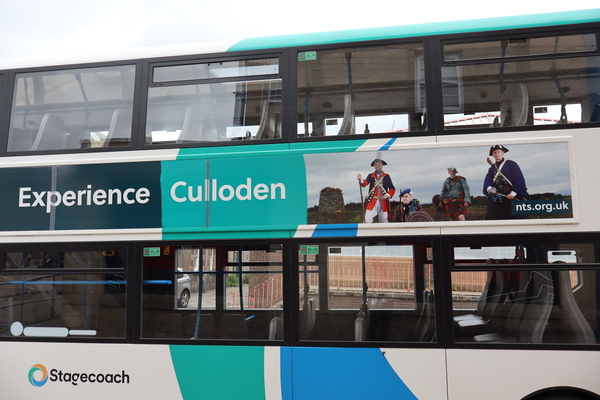 Stagecoach bus with advert for Culloden Battlefield